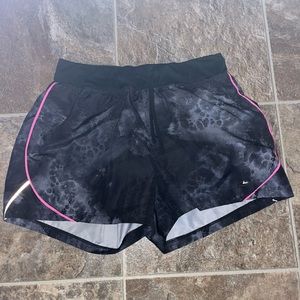 champion small black and pink shorts